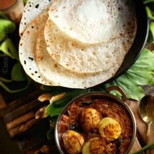 cd1a4fcf454a19fa695511d37fc573f7-3.jpg APPAM MUTTA CURRY